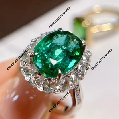 Unique Emerald Ring 925 sterling silver adorned with beautiful side stones beautiful design Emerald Ring Engagement ring wedding ring.