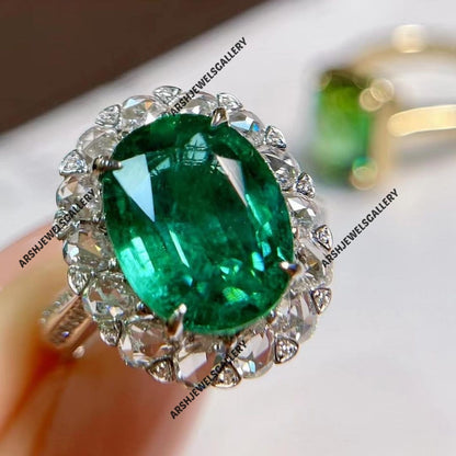 Unique Emerald Ring 925 sterling silver adorned with beautiful side stones beautiful design Emerald Ring Engagement ring wedding ring.